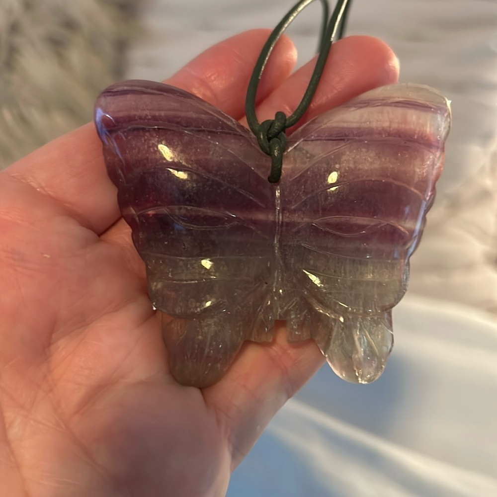 Leather necklace with purple flourite butterfly